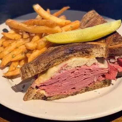 a plate with a sandwich and french fries on it