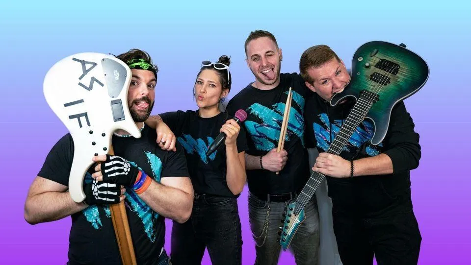 a group of people with guitars posing for a photo