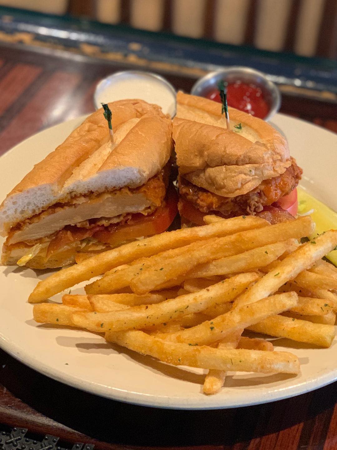 a sandwich and french fries on a plate