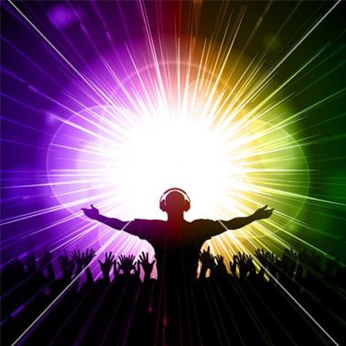 a person with headphones standing in front of a colorful light